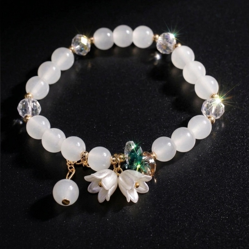 Elegant White Beaded Charm Bracelet with Floral Accents
